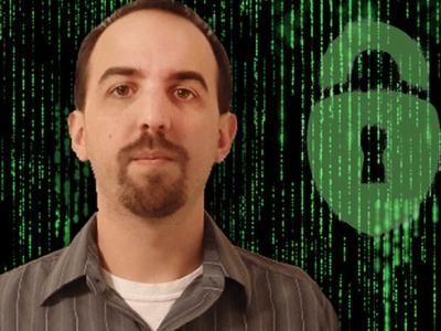 Thomas Richards with green bionary numbers and image of a lock next to him