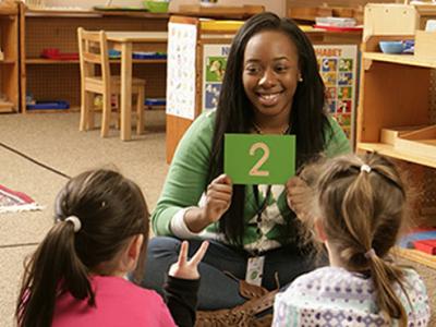 Nahillah High with two youngsters
