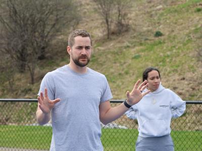 Officer Histed talks with students