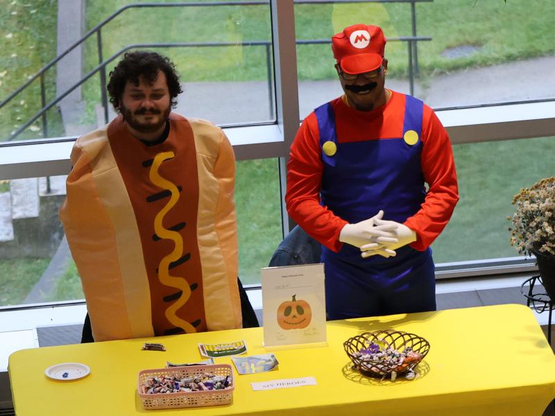 Pair of students at a community Halloween event