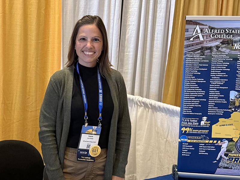 admission counselor at a fair