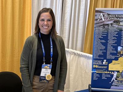 admission counselor at a fair