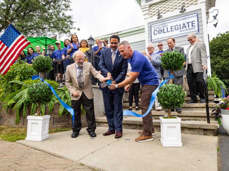 ribbon cutting for the Collegiate