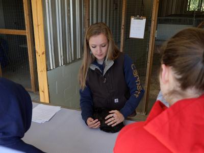 student shows off a bunny