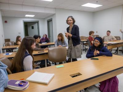 Teacher interacting with students in class
