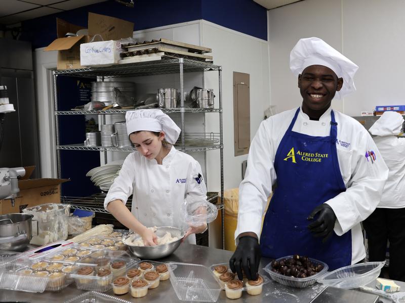 Student works in a baking lab