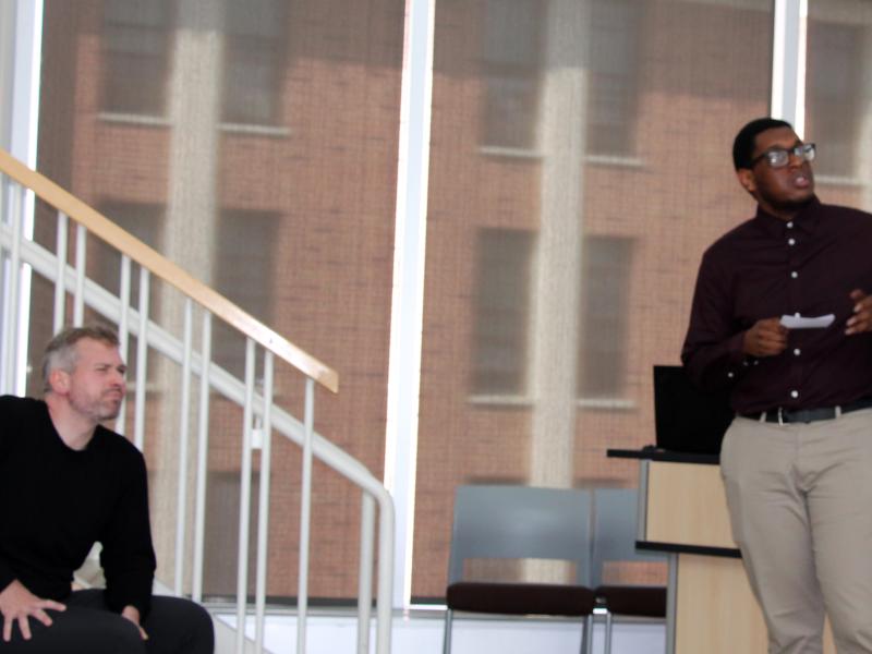 Professor Kevin Hofmann observes a presentation