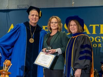 Erica Matteson presented an award