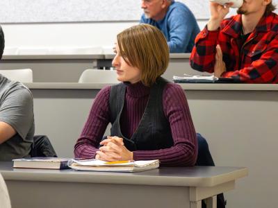 student looks on in a class