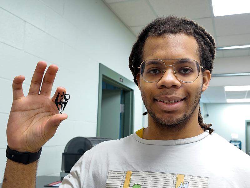 Student shows off a 3D print