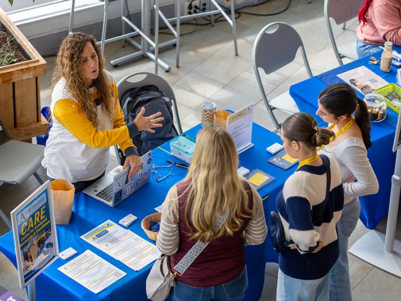 students talk to a member of the student success center