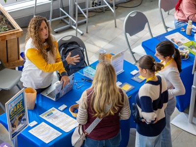 students talk to a member of the student success center