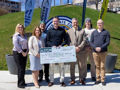 Alstom presents a check to Alfred State to create an endowed scholarship