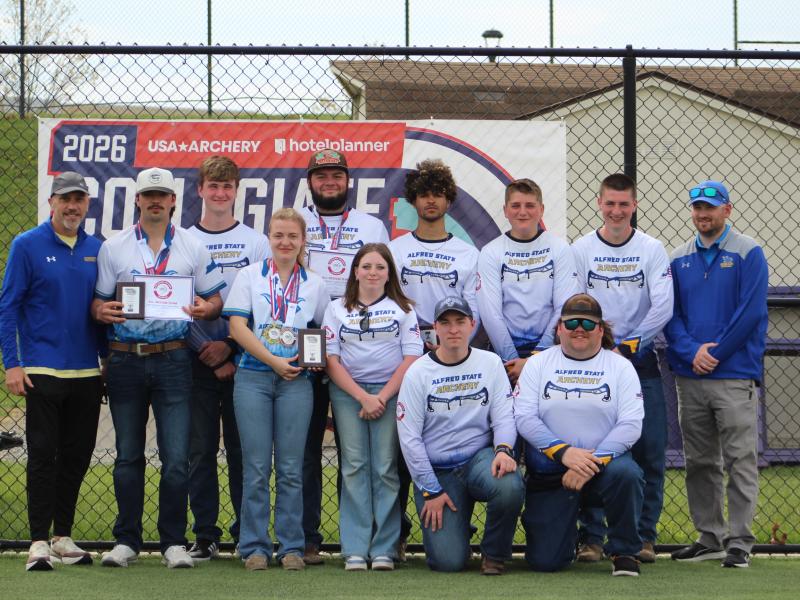 Team photo of the archery team after competition in Virginia.