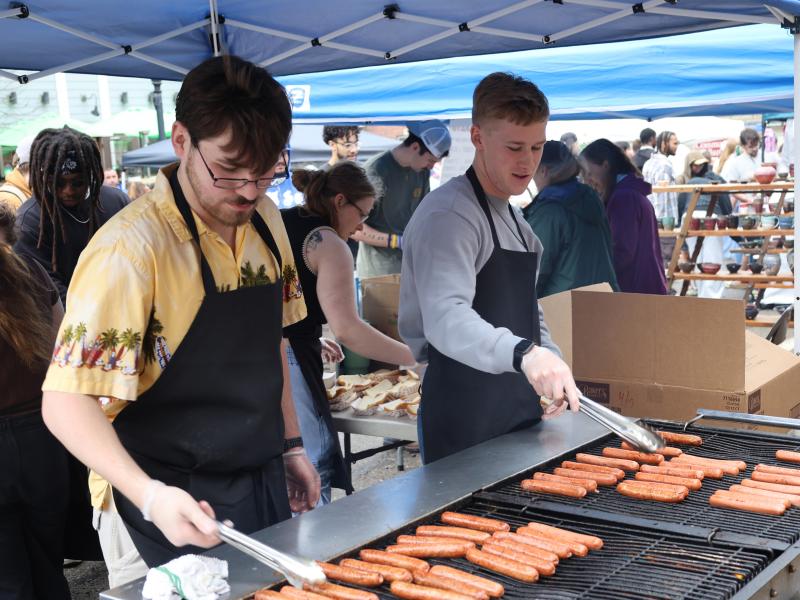 Students prepare hot dogs during last year's Hot Dog Day.