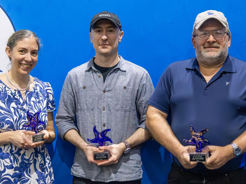 A trio of employees were recognized for their work as advisors to students at Alfred State