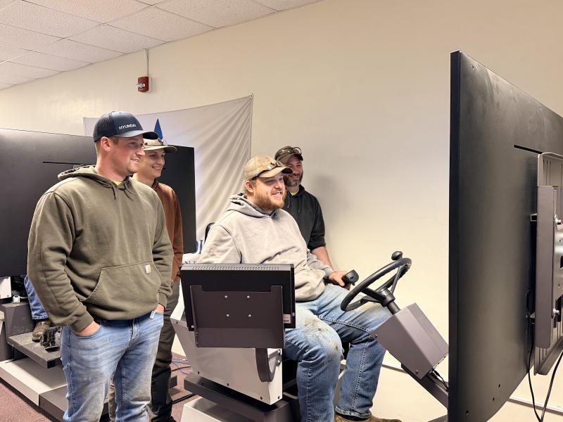 microcredential students work on simulators