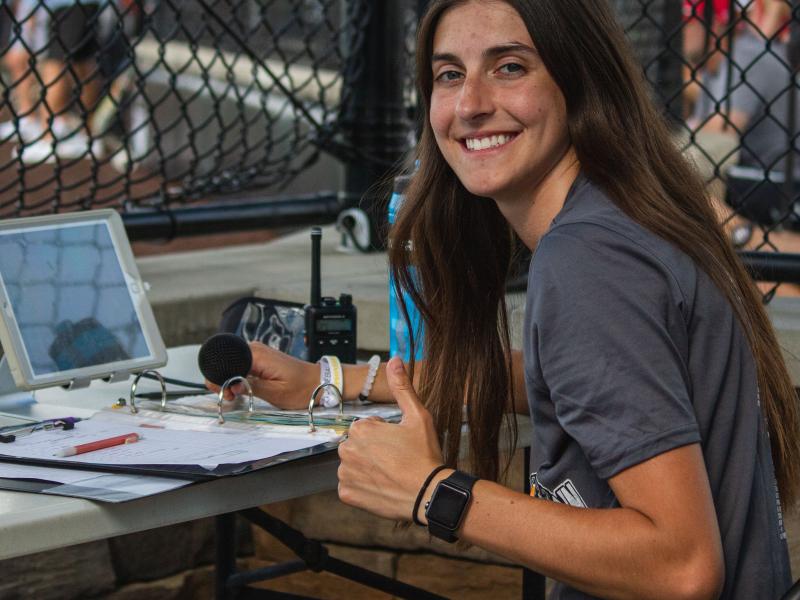 Jenna George works at the Ripken Experience during her internship
