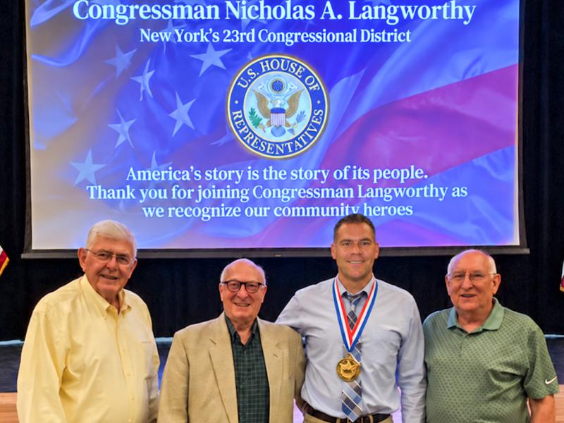 Matt Lawrence receives an award