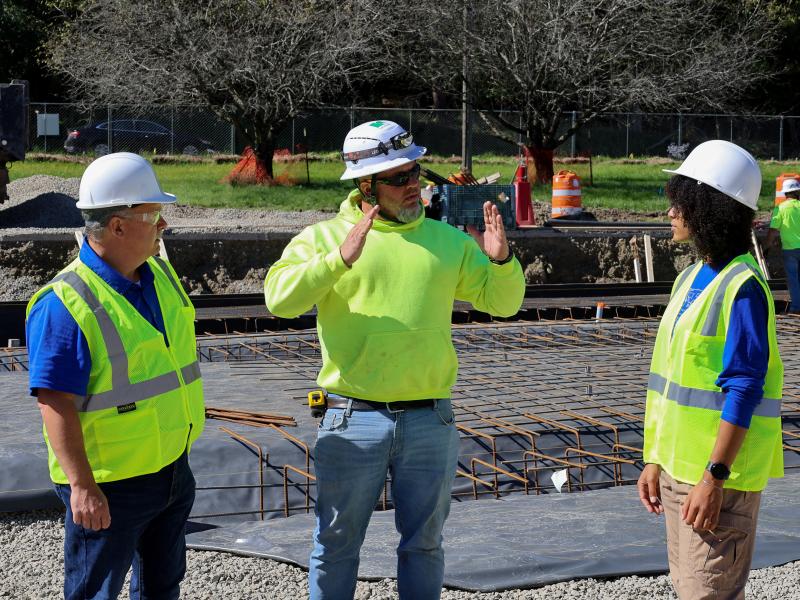 Alum gives tour of construction at Truck & Diesel