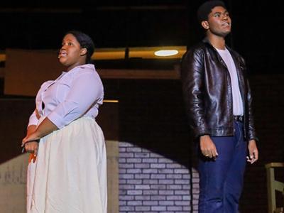 Members of the drama club perform at a past production.