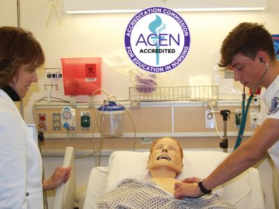 A nursing student works with an instructor in one of the labs on campus.