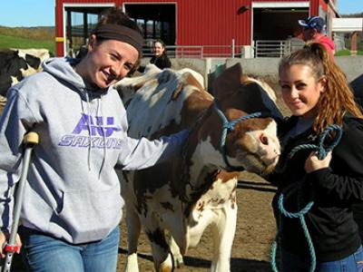 AU volleyball team members at College Farm