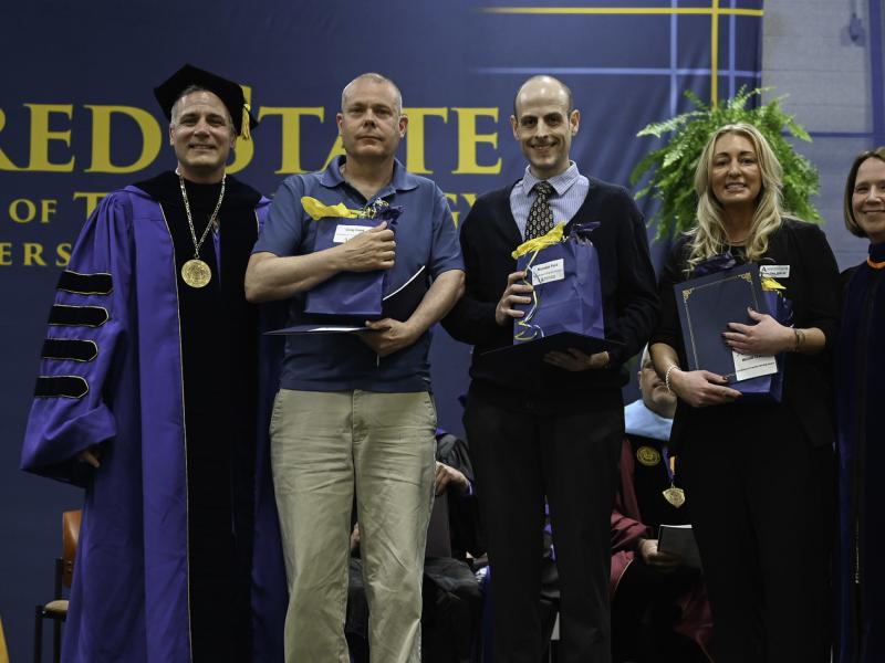 Faculty members are recognized for their work with students.