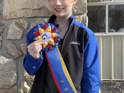 Student displays award