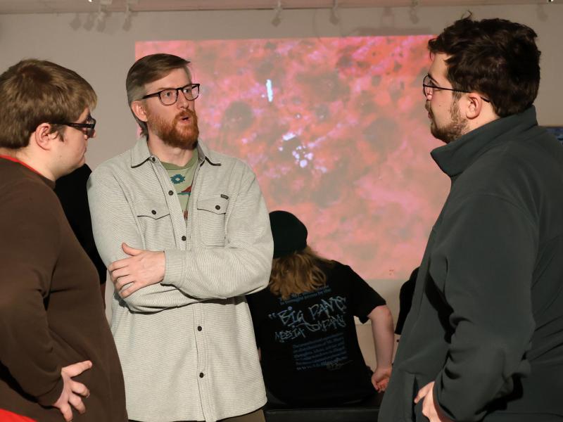 Blake Barit speaks with students