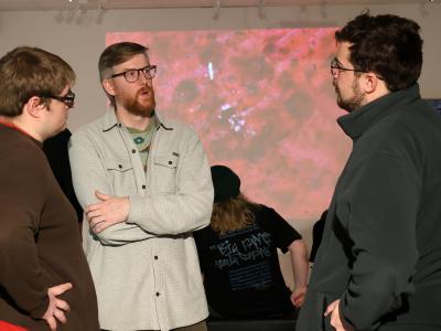 Blake Barit speaks with students