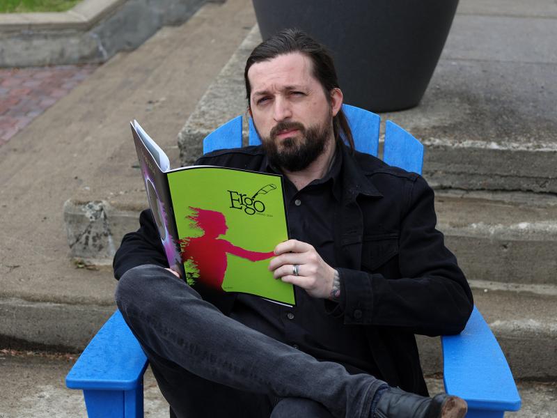 Student reading magazine