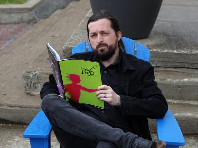 Student reading magazine