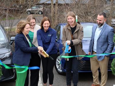 ribbon cutting for new car share program