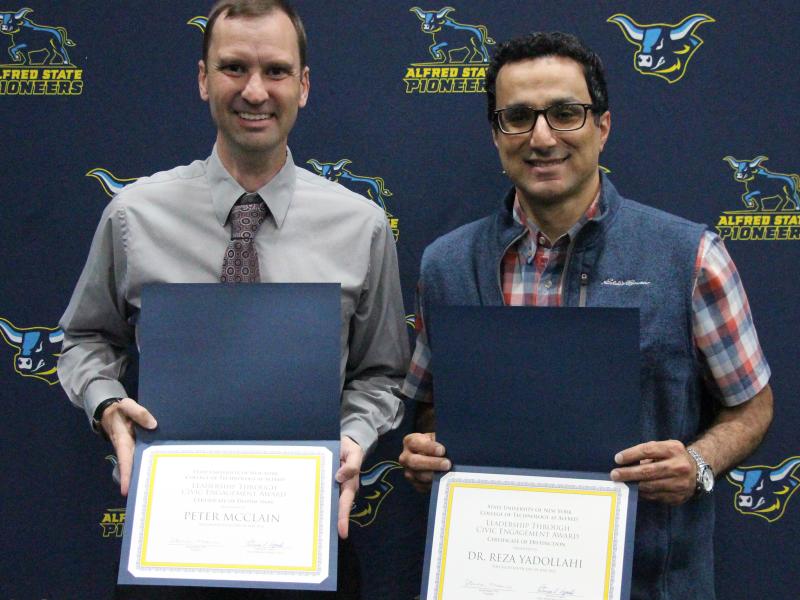 Peter McClain and Dr. Reza Yadollahi were honored with the Leadership through Civic Engagement award.