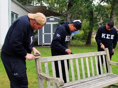 Students repair a bench
