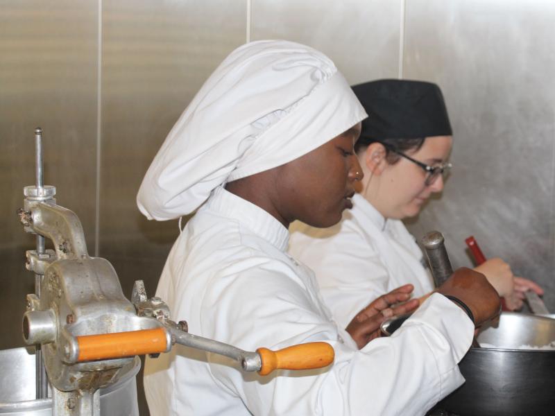 Culinary Arts students work in the kitchen.