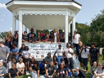 students in front of a gazebo