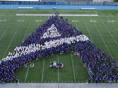 Alfred State first-year students make their first “A” at Pioneer Stadium prior to the start of the Fall 2022 semester. This picture was the most shared picture of 2022.