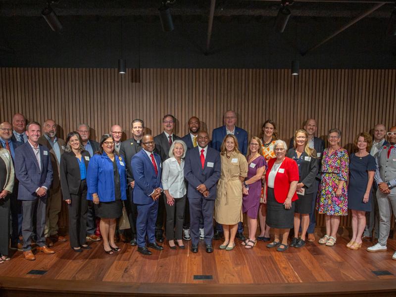 Representatives of education organizations that were recipients of gifts from Tom Golisano