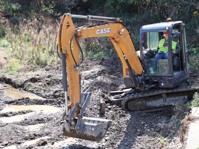 student driving heavy equipment