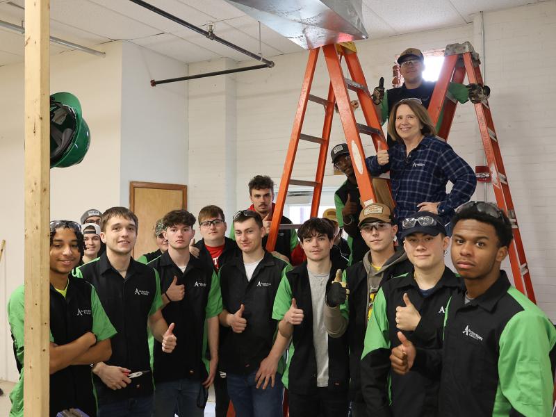 Carrie Cokely with a first year HVAC class