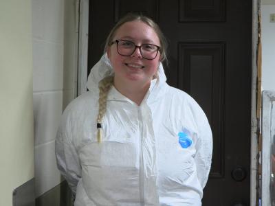 student in a crime lab