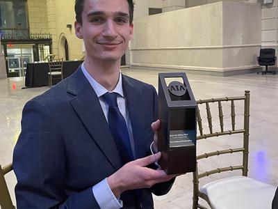 Alec Harrigan with his Student Project Award.