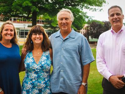 Russell and Brenda Herman pose with President Steve Mauro and Vice President of Institutional Advancement Danielle White when they returned to campus this summer.