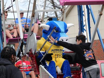 Big Blue rides a Ferris wheel