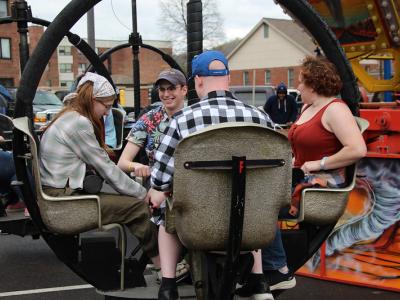 Students enjoy one of the rides at the Alfred State Carnival. The carnival was part of Hot Dog Day festivities.