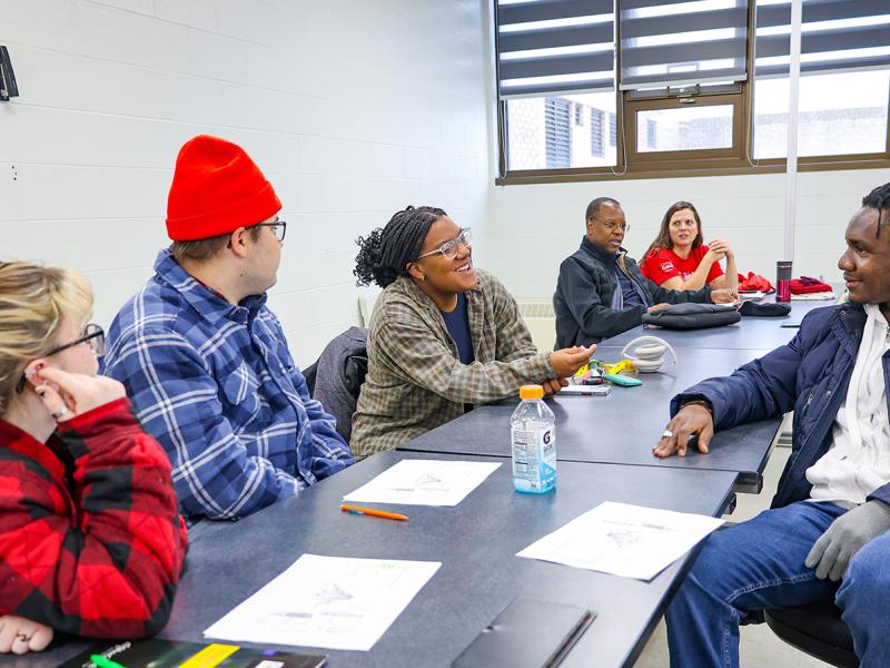 Students interact with a Humphrey Fellow