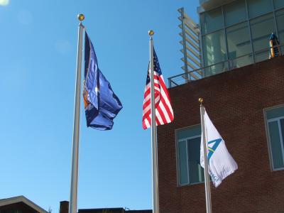Flag poles outside of the Student Leadership Center