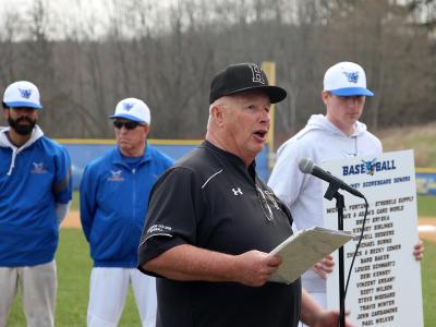 Tom Kenney addresses the fans in a pre-game ceremony that was held before Alfred State took on Houghton University. 